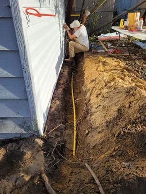 Residential trenching for new service line