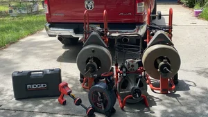 Professional sewer and drain cleaning equipment staged for use